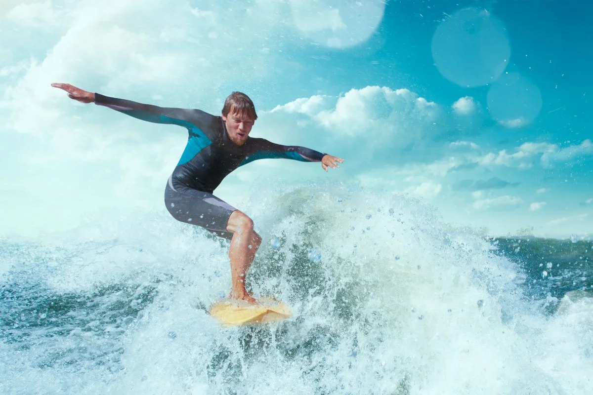 client during surf therapy in Jacksonville, FL
